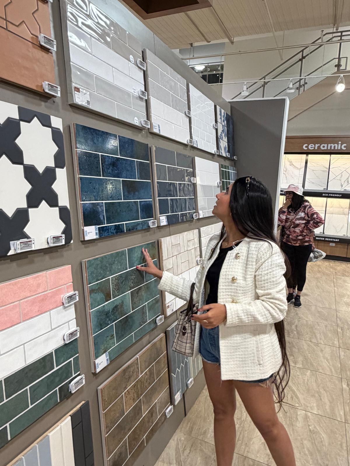 Shreya Agarwal reviewing colorful tile options